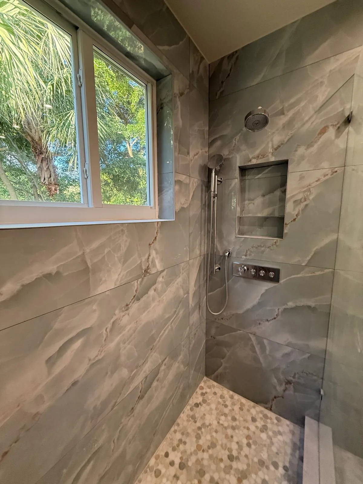 Marble shower with recessed storage niche — Pompano Beach, FL