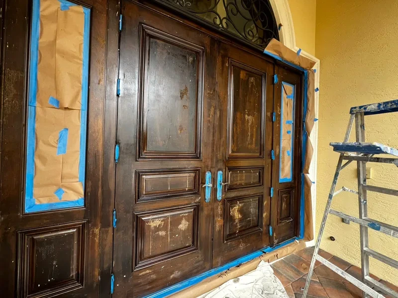 Stained interior door with protective topcoat