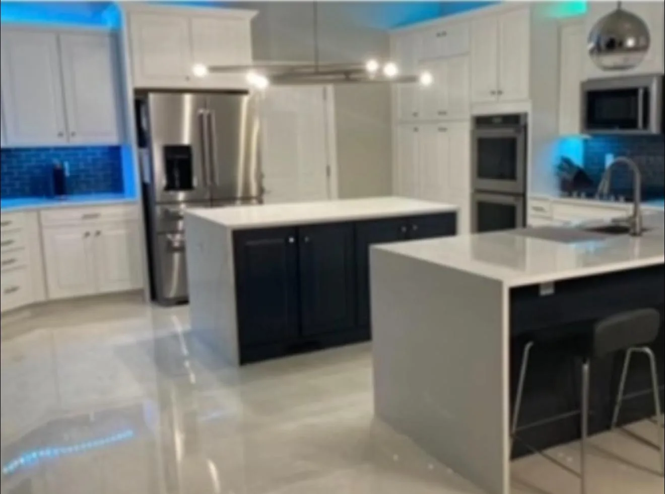 Waterproof luxury vinyl plank flooring installation with wood-look finish in South Florida home